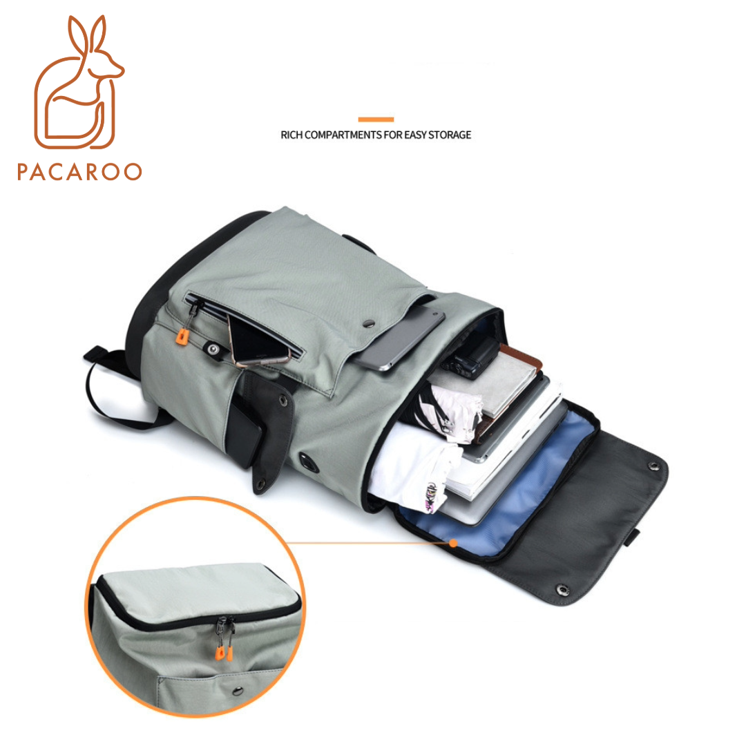 Gray backpack with compartments and a visible brand logo on a white background